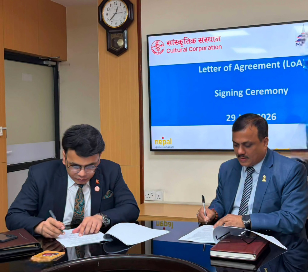 Signing Photo.jpg